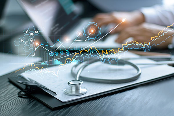 Clipboard with stethoscope and overlay of graphs