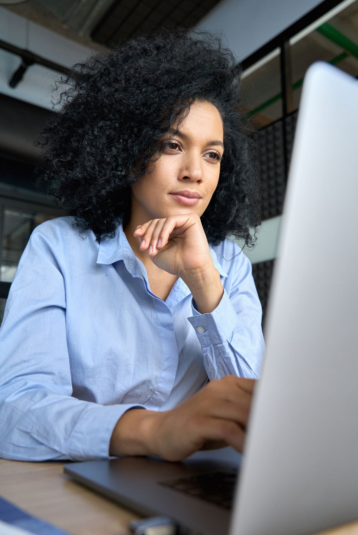 business woman looking at a laptop